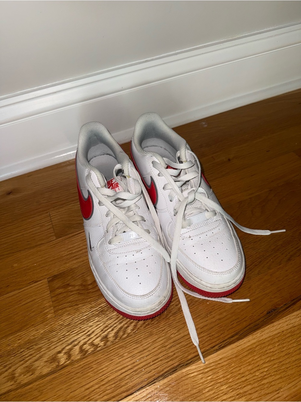 Nike women 8.5 / Kids 7 White Sneakers with Red Swoosh